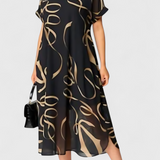 Vestido Negro con Estampado Abstracto en Oro y Escote en V