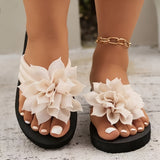 Alejandra | Sandalias con flor elegante