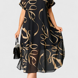 Vestido Negro con Estampado Abstracto en Oro y Escote en V