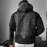 Sudadera oversize con capucha de estampado ornamental – Negro y antracita