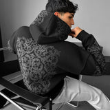 Sudadera oversize con capucha de estampado ornamental – Negro y antracita