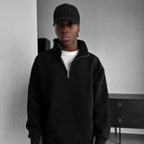 Sudadera oversize tipo polo con media cremallera – Negro