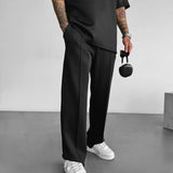 Pantalón de tejido técnico de corte holgado – Negro