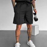 Pantalón corto de tejido técnico con costuras – Negro