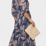 Vestido Largo Floral con Corte Fluido y Motivo de Hojas