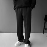 Pantalón de tejido técnico de corte holgado – Negro