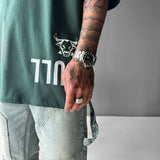 Camiseta oversize Bull – Petróleo