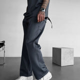 Pantalón de tejido técnico de corte holgado – Antracita