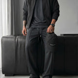 Pantalón básico de pinzas y corte holgado – Gris tormenta