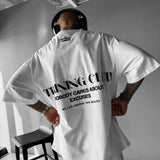 Camiseta oversize Training Club – Crudo