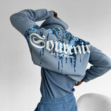 Sudadera oversize con capucha Souvenir – Denim lavado