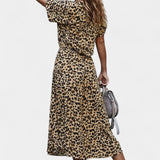 Vestido Midi de Lunares con Cuello Camisero y Cintura Ajustable