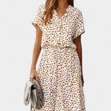 Vestido Midi de Lunares con Cuello Camisero y Cintura Ajustable