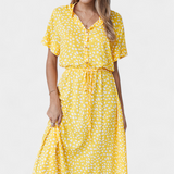Vestido Midi de Lunares con Cuello Camisero y Cintura Ajustable
