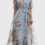 Vestido Midi Floral con Escote en V y Silueta Femenina