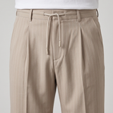Pantalón a rayas de corte holgado – Beige